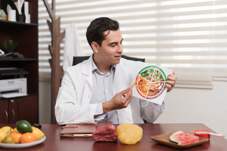 Nutrition doctor showing eating plate