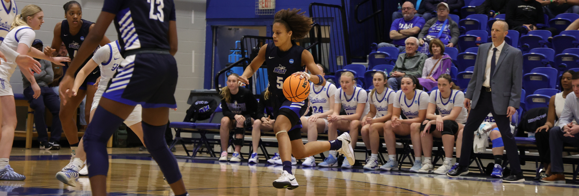 Women's Basketball team playing a game