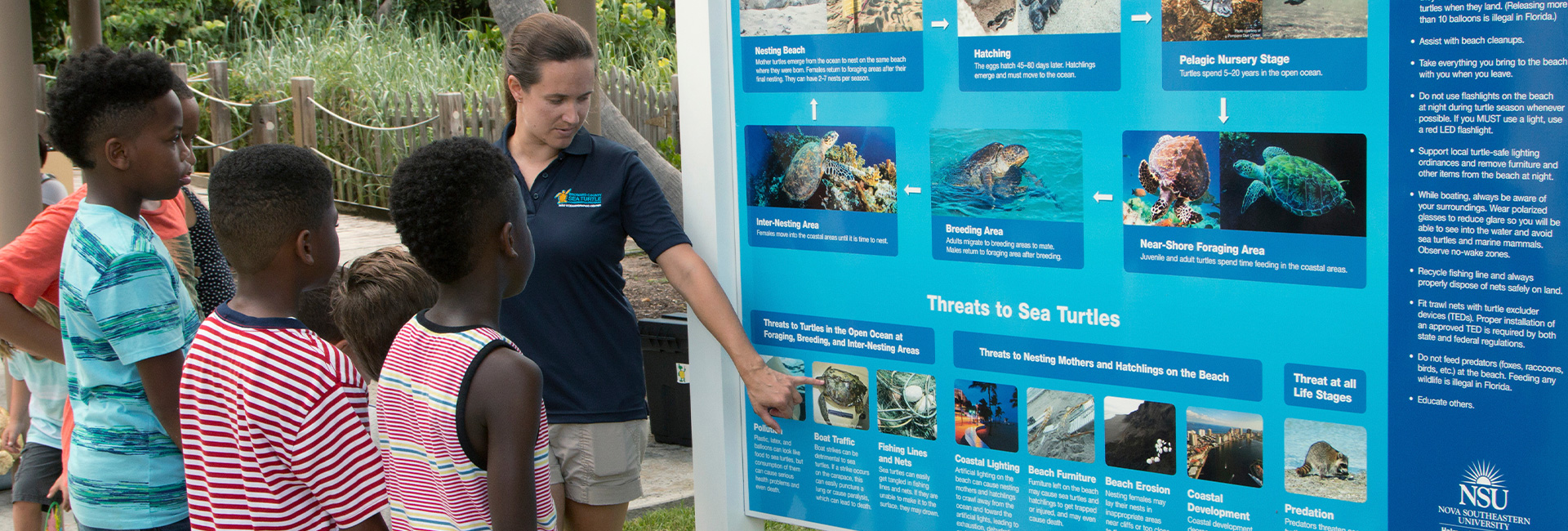 Marine expert doing sea turtles presentation to children