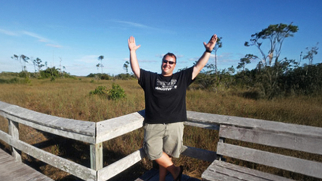 Derek Burkholdern posing for a picture outdoors
