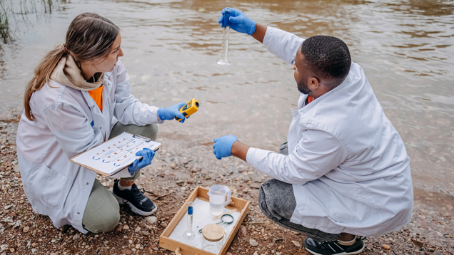 student researcher with her presentation