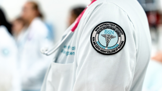 NSU nursing uniform whitee coat closeup view