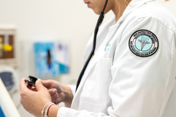 nurse holding stethoscope 