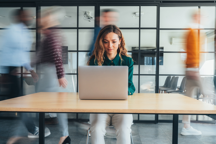 Business woman at the office using computer