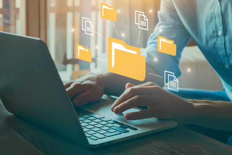 Person using computer to file share