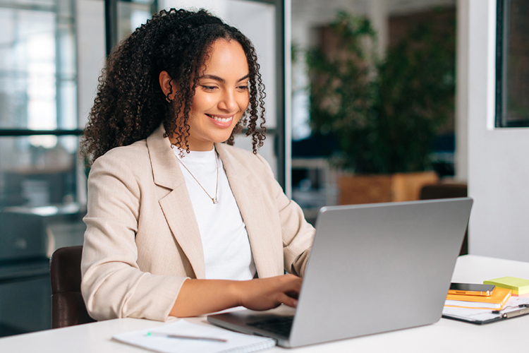 Woman using a laptop in the office