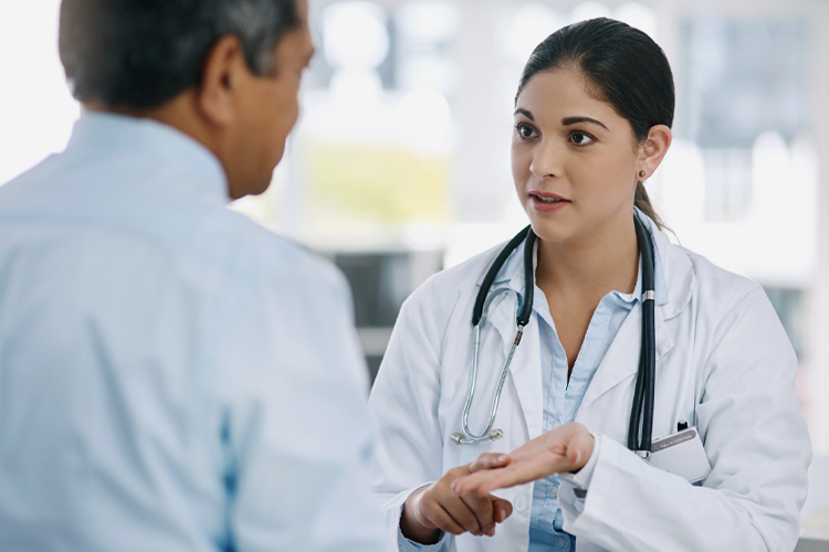 Doctor speaking with her patient