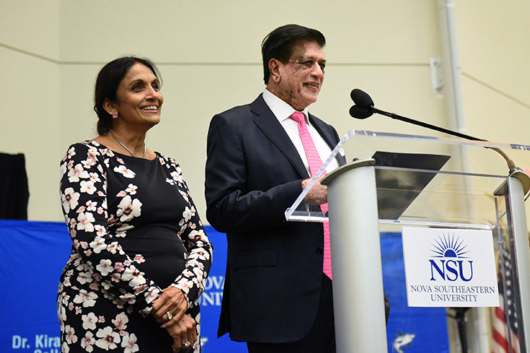 Doctors Kiran C and Pallavi Patel speaking at an event
