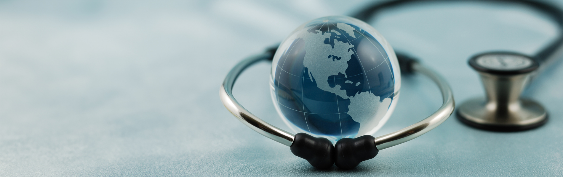 Globe and stethoscope healthcare concept photo
