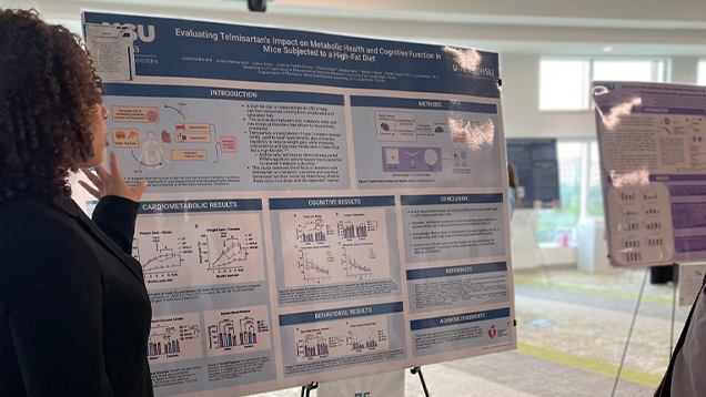 Julianna Bonetti presenting research material