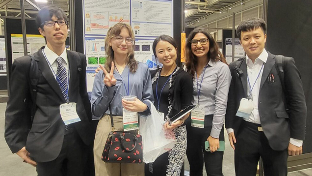 Maria Castellon with colleagues at an event