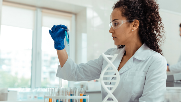 Scientist holding a test tube at the lab