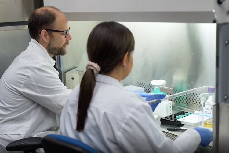 Graduate student researcher doing training