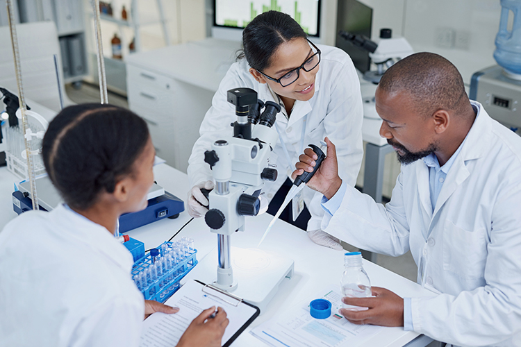 Group of scientists working together in a lab