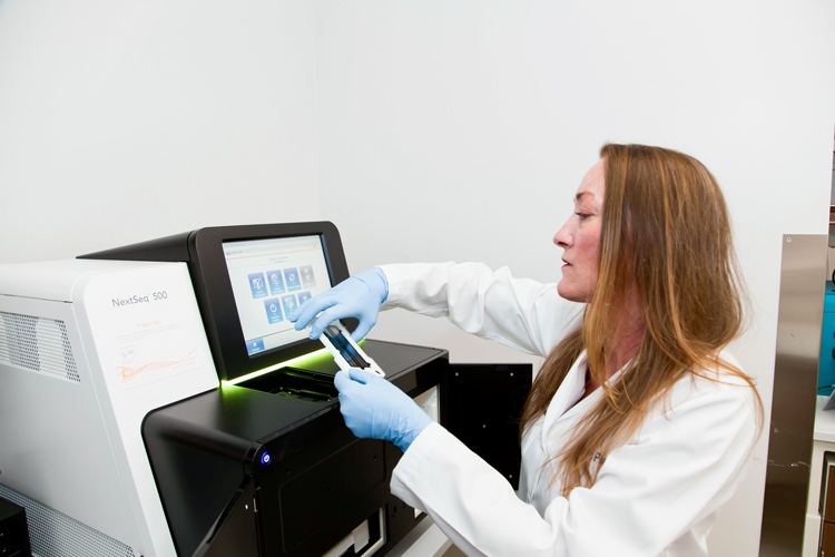 Scientist using machine closeup
