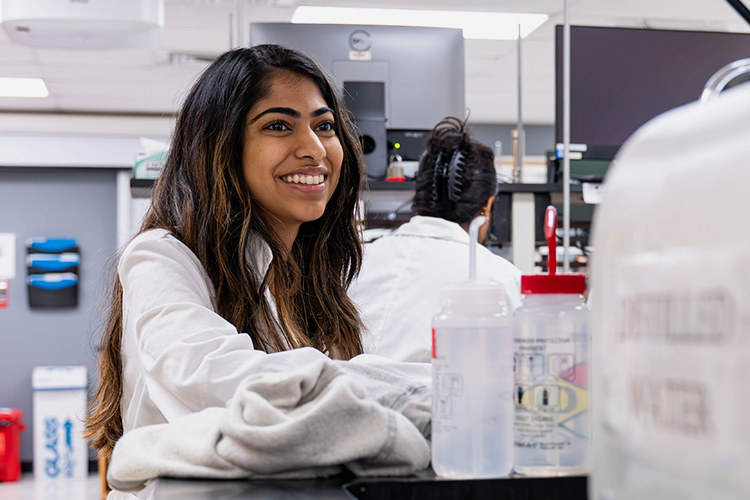 Two NSU students in a lab
