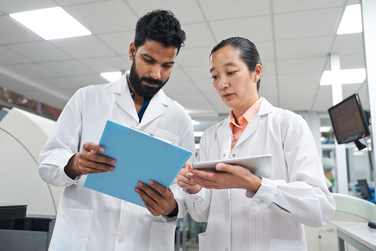 Two researchers working together in a laboratory