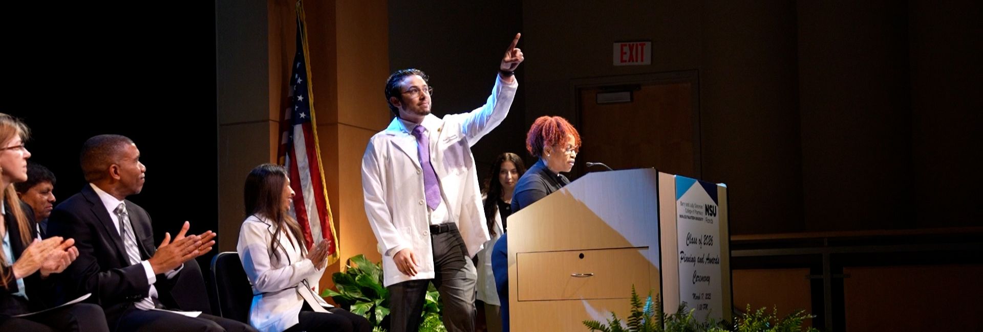 abran fernandez presenting in front of a crowd