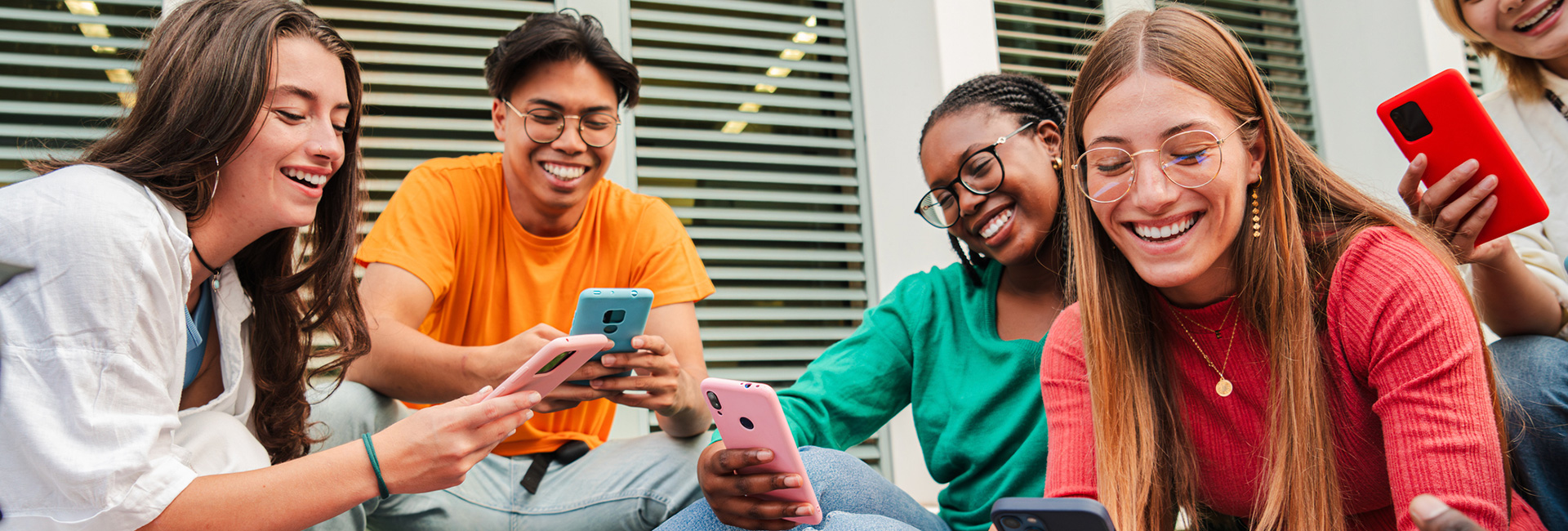 Group of students using their phones