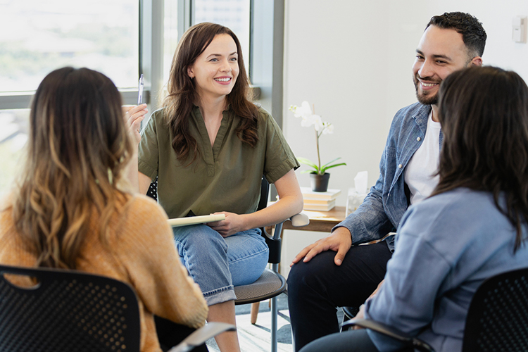 Counselor guiding a support group
