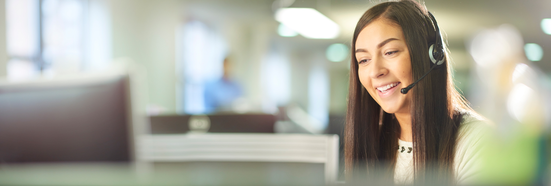 Women working on telecommunications speaking on a call