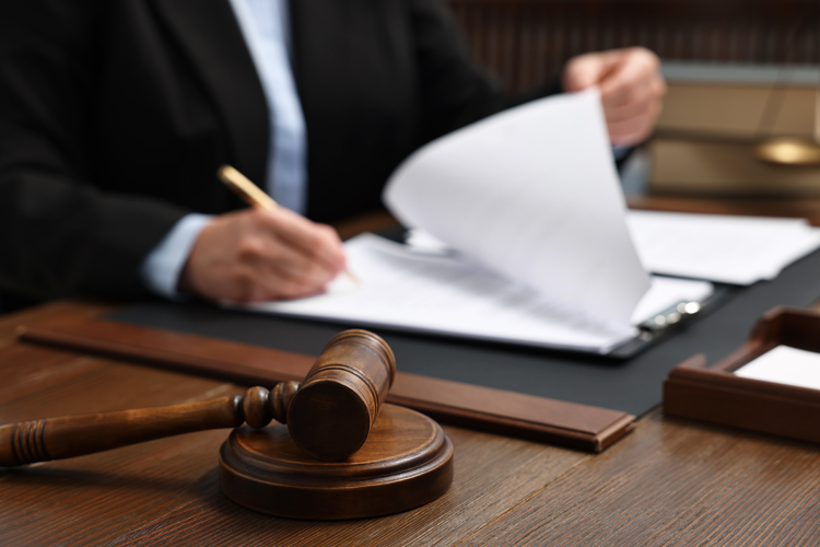Person reading rights papers at court