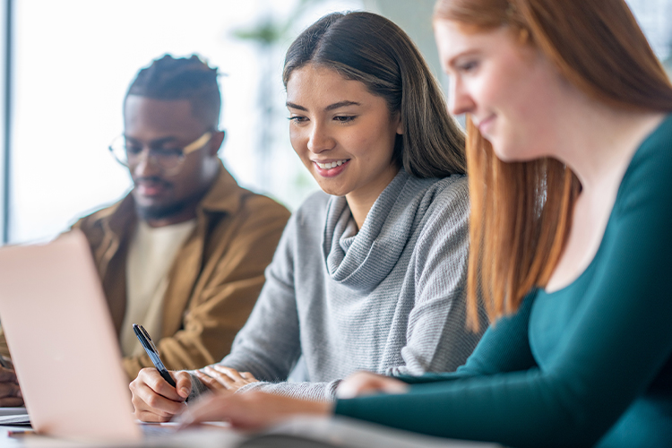 Three students studying in class