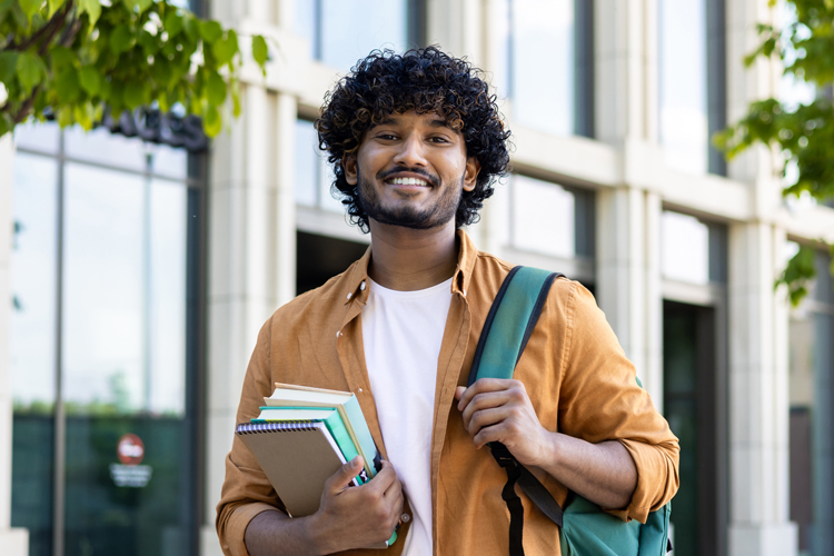University student portrait standing outside