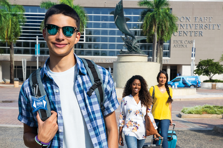 Visit us international student walking on campus