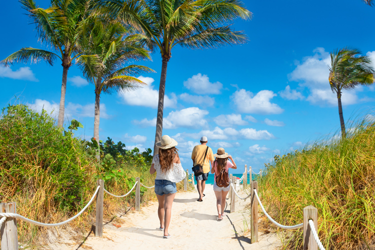 Walking into South Florida beach