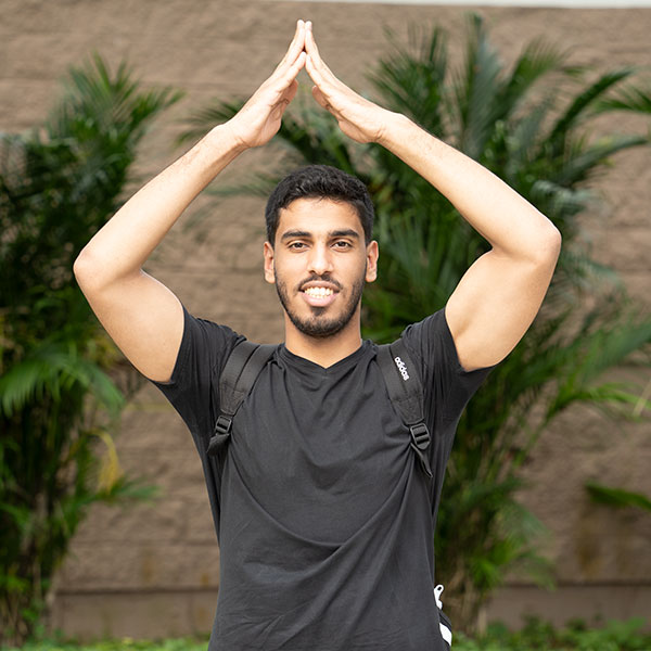 young man with fin's up