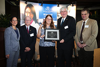 Nova Southeastern University (NSU) Executive Vice President and Provost Ralph V. Rogers Jr., Ph.D., recently presented Nancy Klimas, M.D., with the 5th Annual Provost's Research and Scholarship Award.