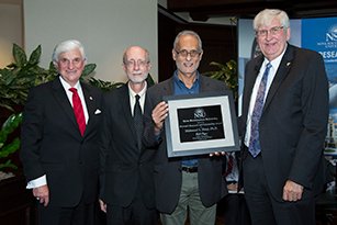 Nova Southeastern University (NSU) Executive Vice President and Provost Ralph V. Rogers Jr., Ph.D., recently presented Nancy Klimas, M.D., with the 5th Annual Provost's Research and Scholarship Award.