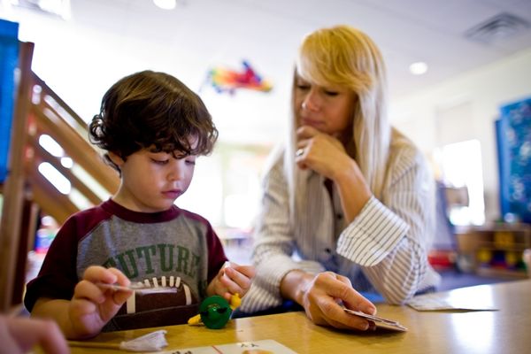 doctor working with child