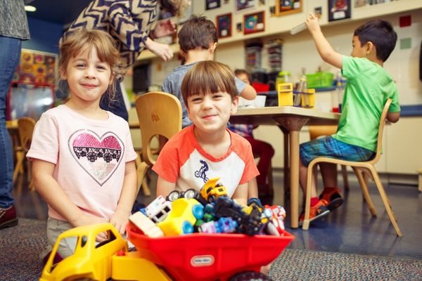 two children playing at the family center