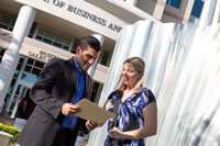 Students outside of the H. Wayne Huizenga College of Business & Entrepreneurship