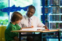 Teacher teaching student