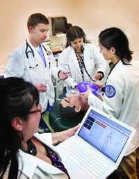 Osteopathic medicine students with professor