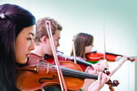 Student playing the violin