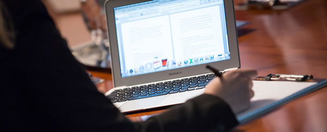 Student taking classes from computer