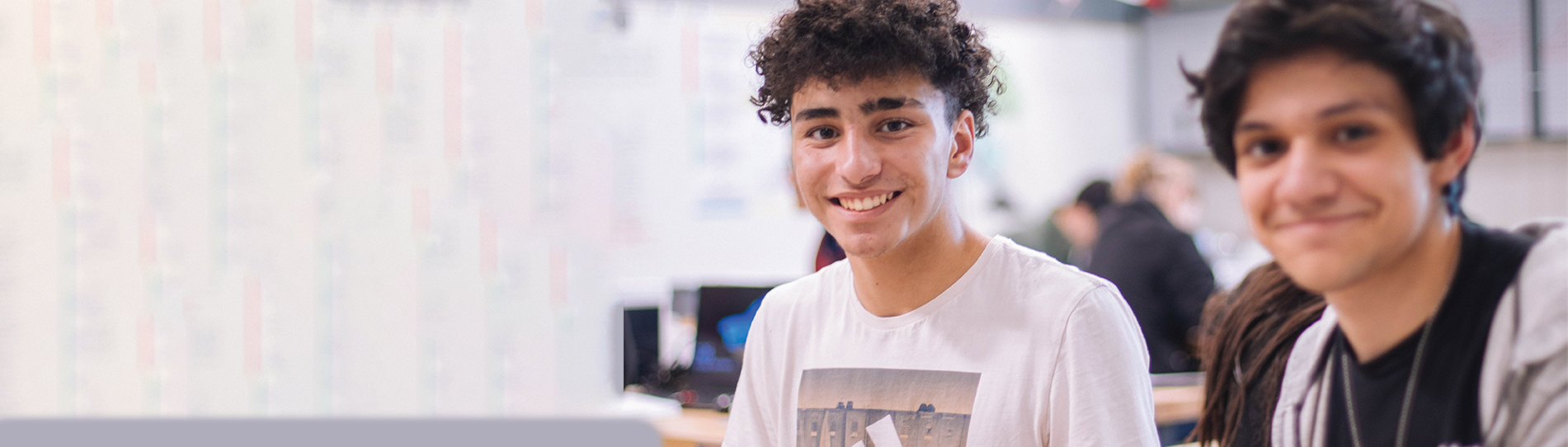 two students smiling