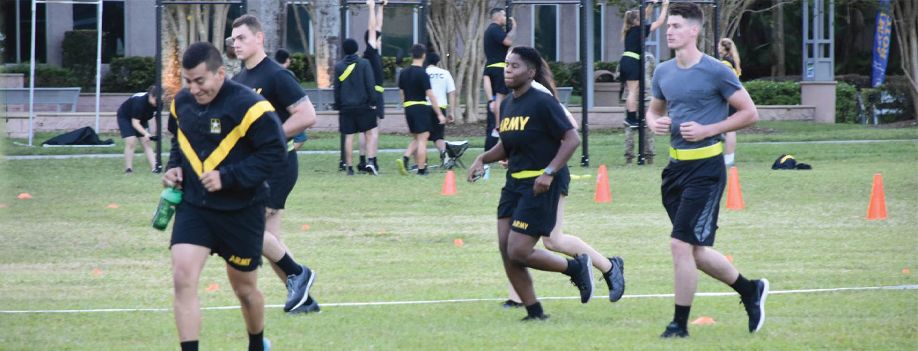 rotc students running on field