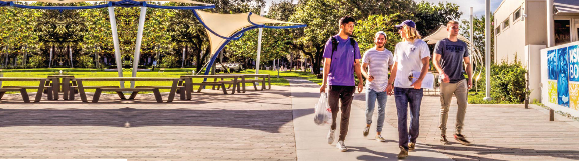 group of students walking on campus