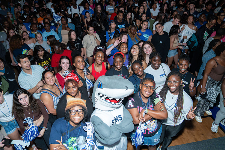 Homecoming pep rally students celebrating