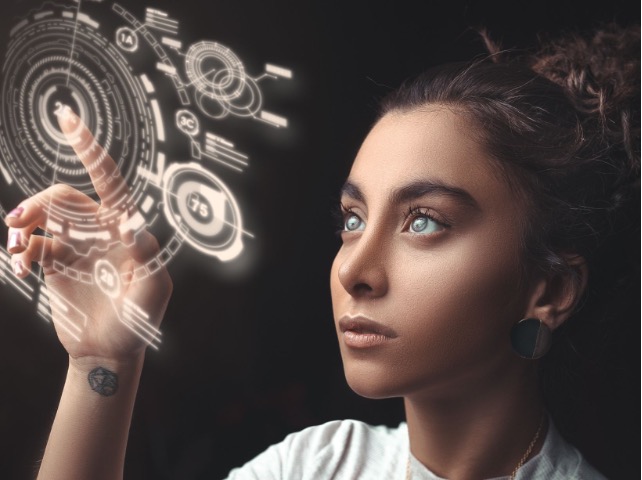 image of girl looking at hologram