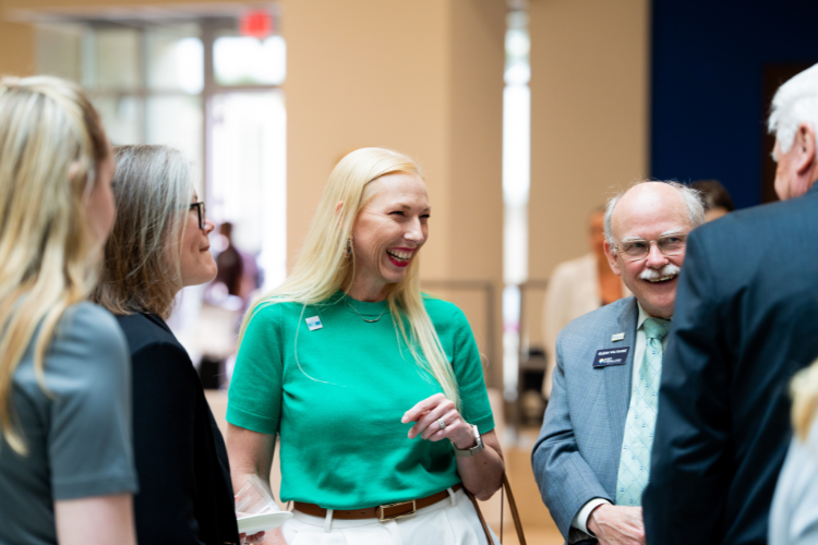 Group of professionals conversing