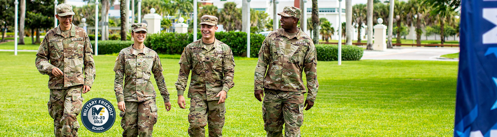 NSU students in army fatigues walking on campus